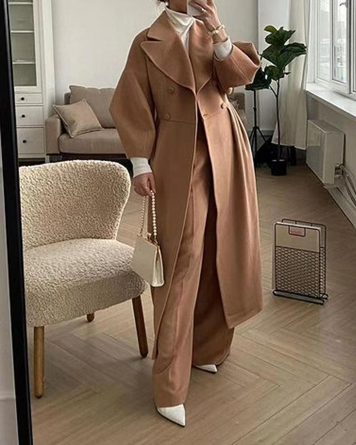 Chic winter fashion women's long coat featuring double breasted buttons
