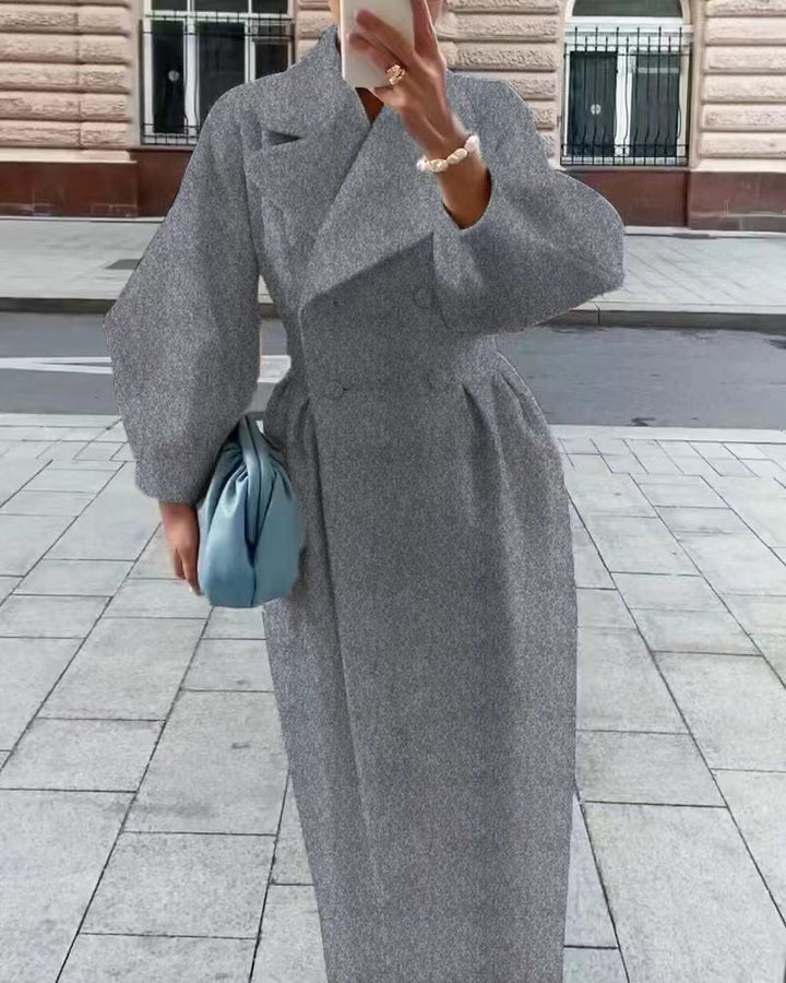Full length view of a fashionable women's winter coat with buttons