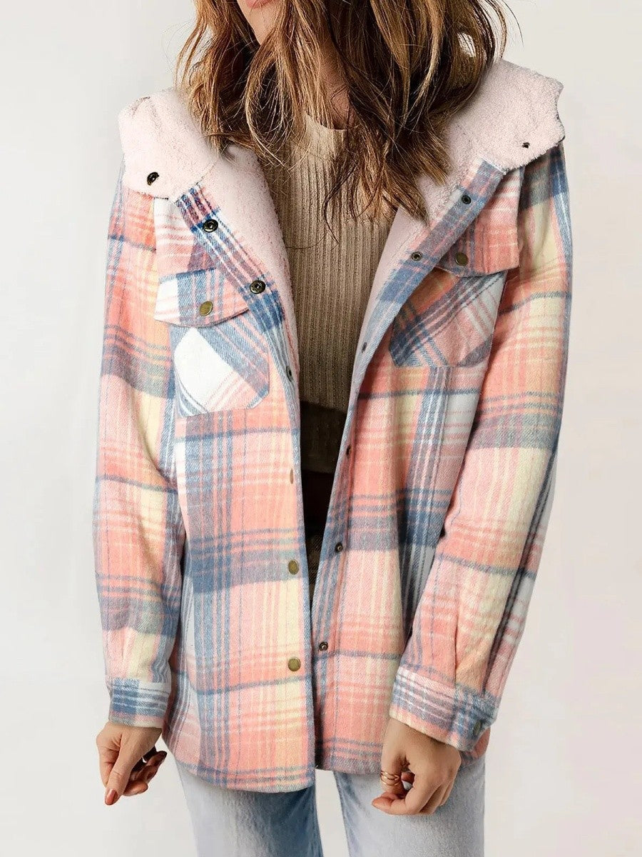 Side profile of a woman wearing the stylish plaid hooded outerwear piece