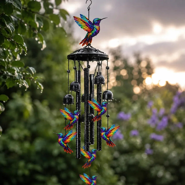 Colorful animal garden wind chime displayed against an outdoor backdrop