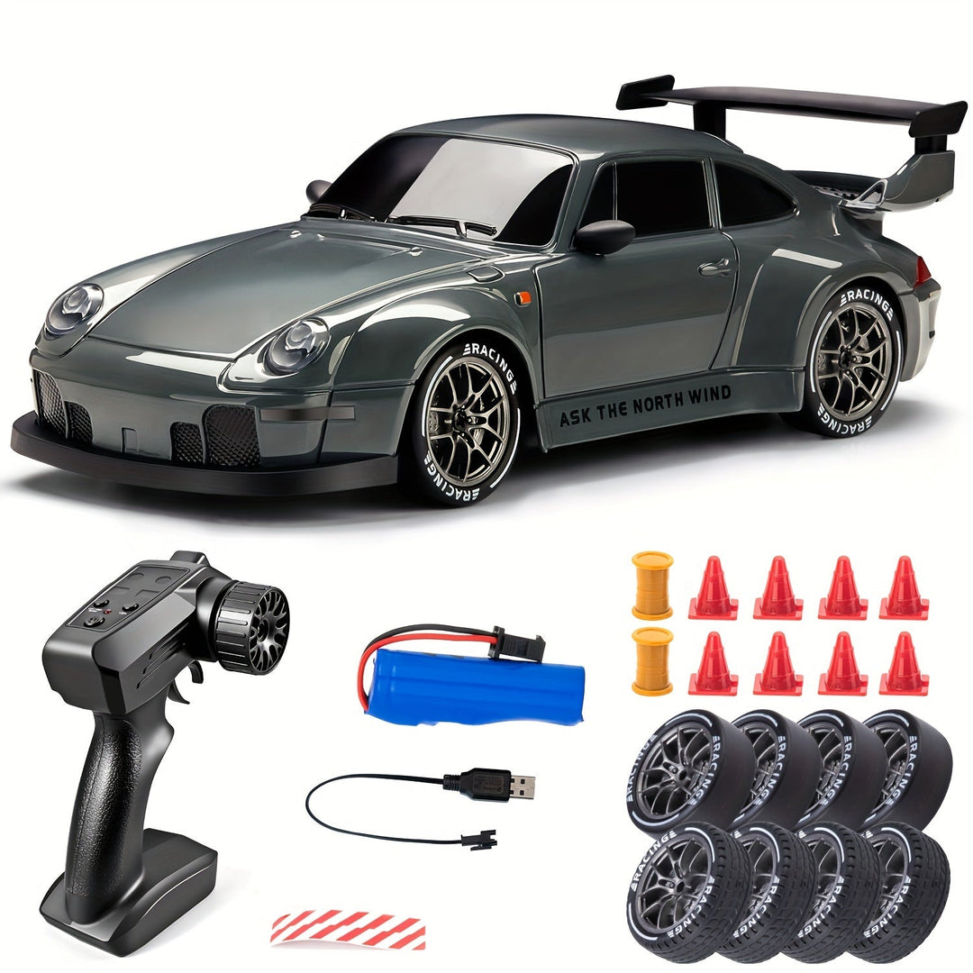 Grey 1:24 scale RC drift car with remote control and accessories