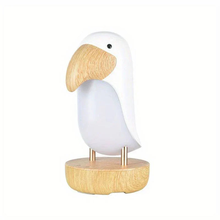 White rechargeable bird nightlight shaped like a woodpecker on a wood base