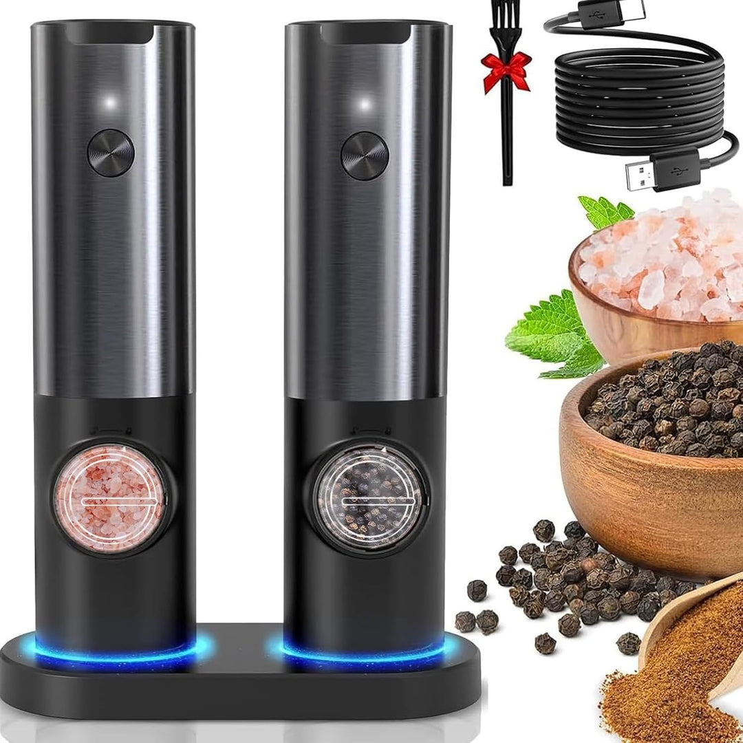 Electric salt and pepper mill set in black and silver on charging base with spices