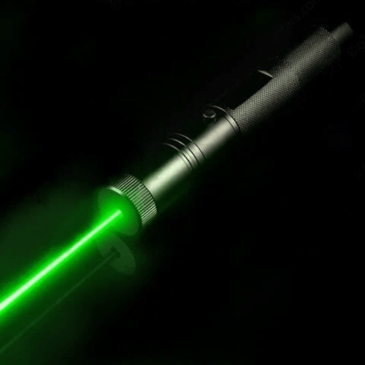 Rechargeable laser pointer projecting a bright green beam in the dark