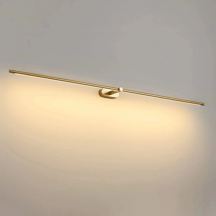Gold rechargeable wall light mounted horizontally with warm LED lighting