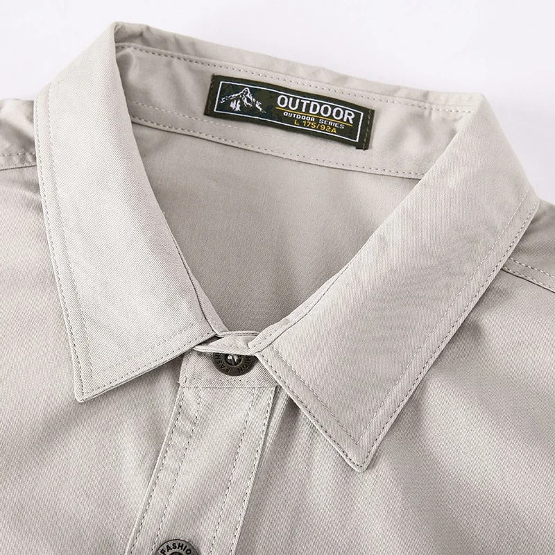 Close-up of the collar and brand label on the men's utility shirt