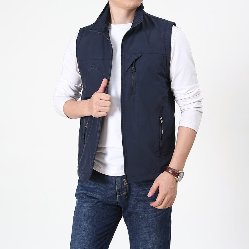 Mens lightweight outdoor vest detail view of zipper and fabric for hiking and layering