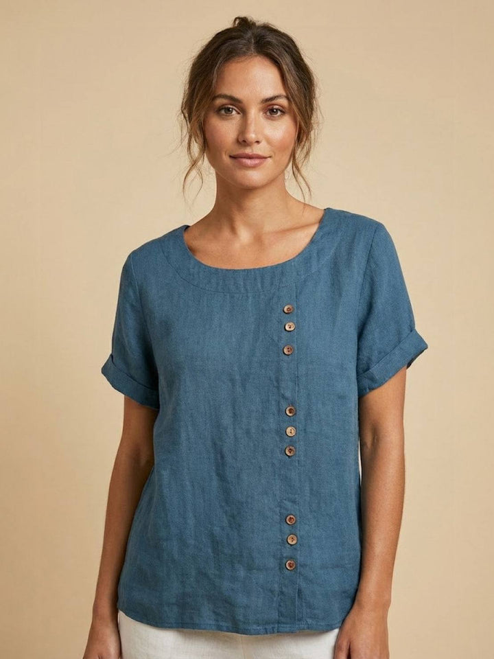 Model wearing deep teal casual short sleeve tee with buttons