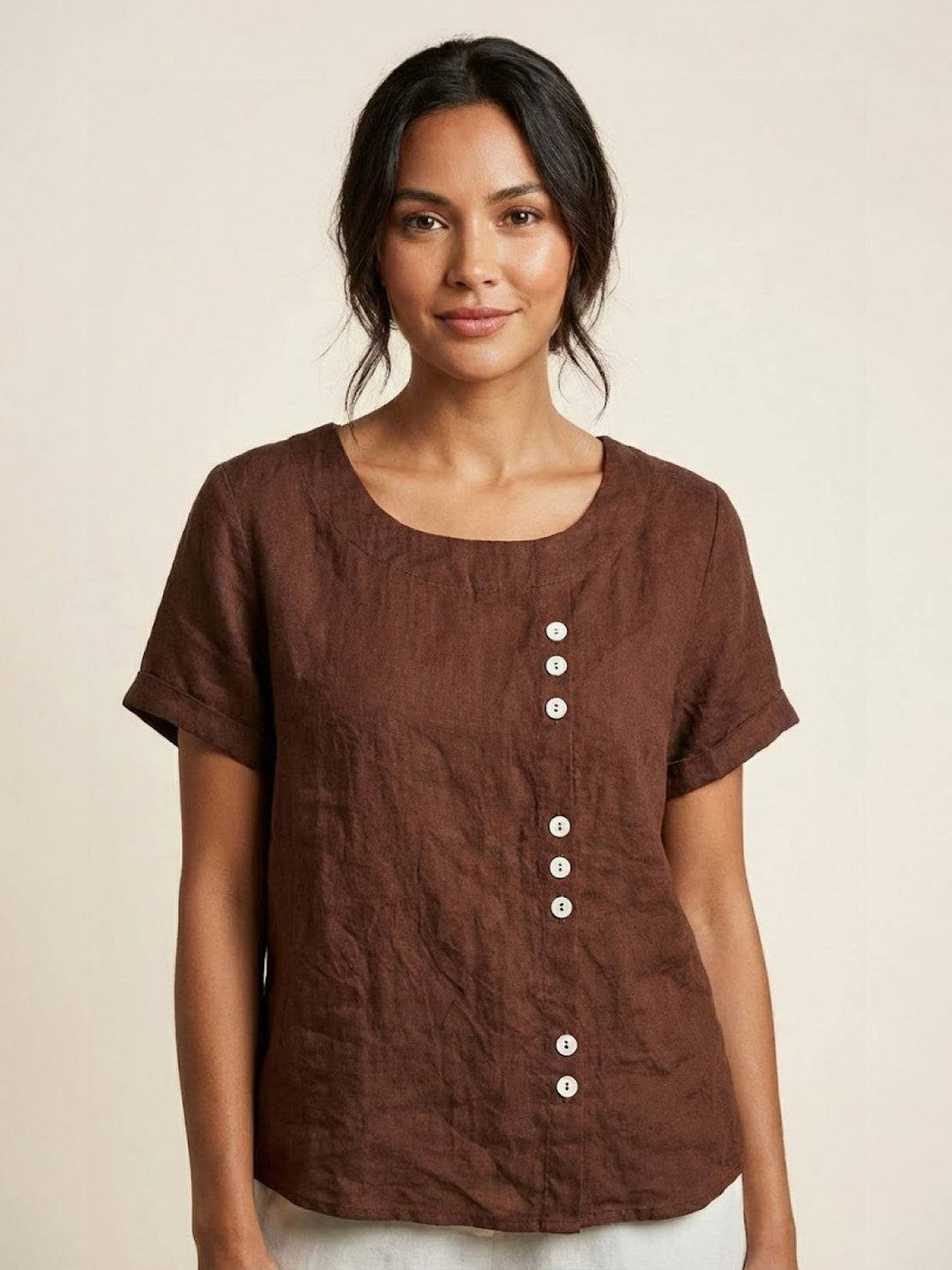 Model wearing coffee brown relaxed fit button-detail top