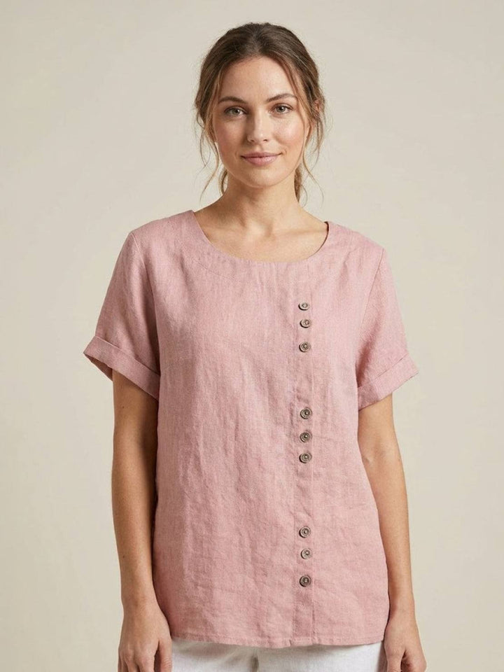 Close-up of scoop neck and decorative buttons on women's casual tee