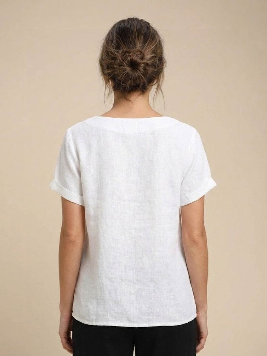 Close-up of neckline trim on women's casual tee