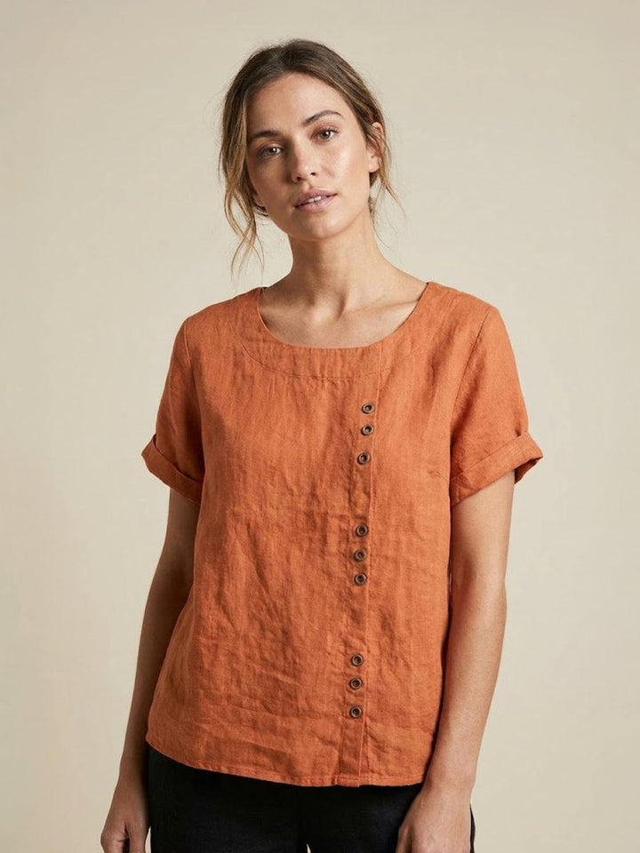 Side view of women's casual short sleeve scoop neck button tee