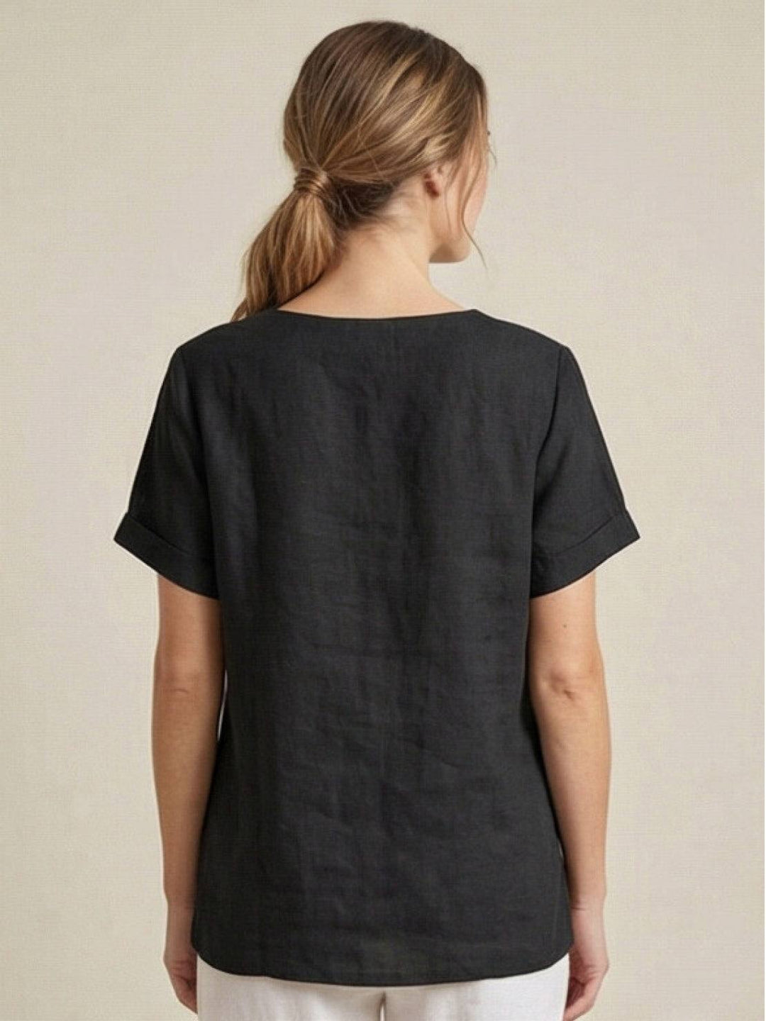 Front placket detail on women's scoop neck casual top