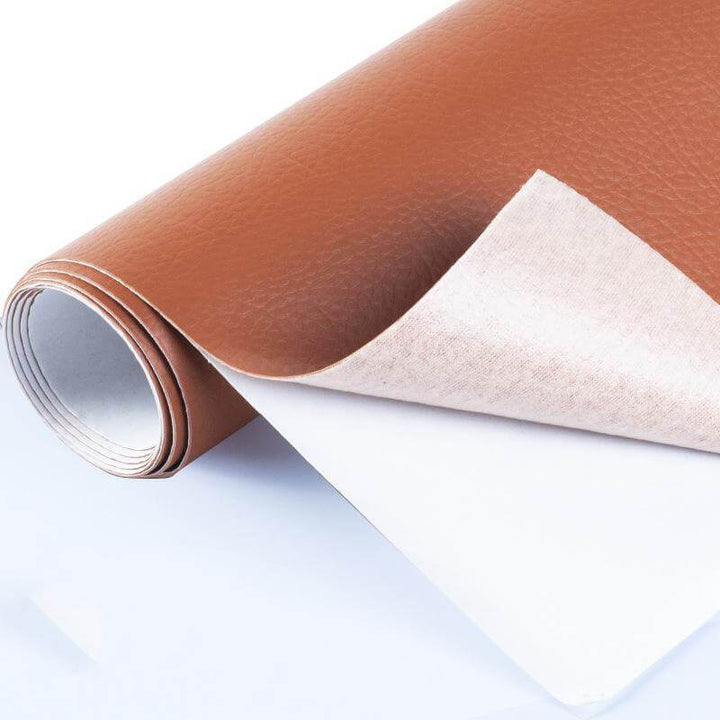 Waterproof leather repair patch mending a scratched armchair