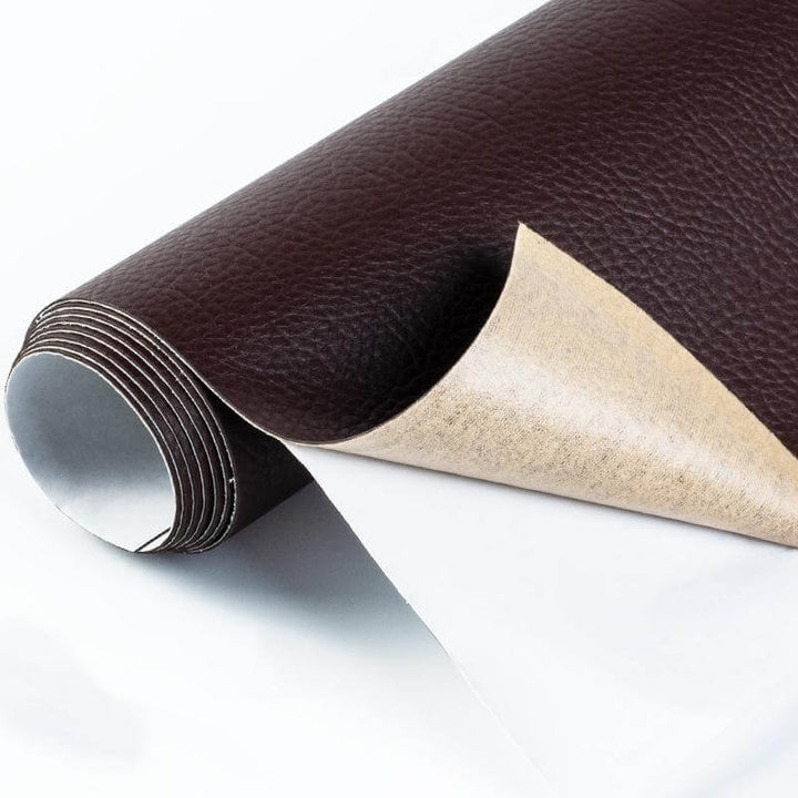Flexible leather repair tape restoring an old leather jacket