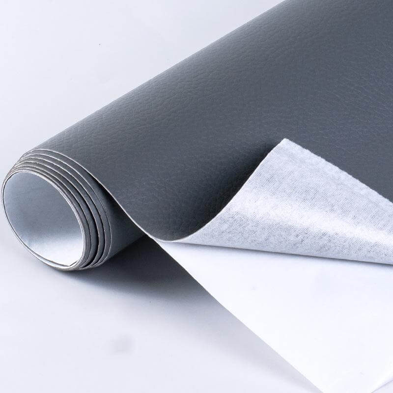 Strong adhesive backing on a brown leather repair patch sheet