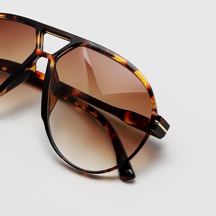 Unisex retro oversized aviator sunglasses displayed on a neutral surface