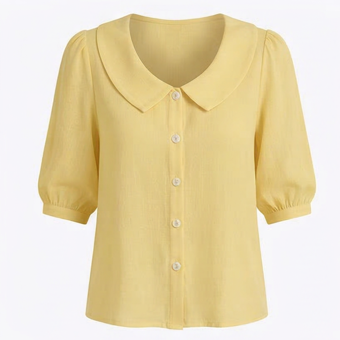 Yellow retro Peter Pan collar button up blouse displayed flat