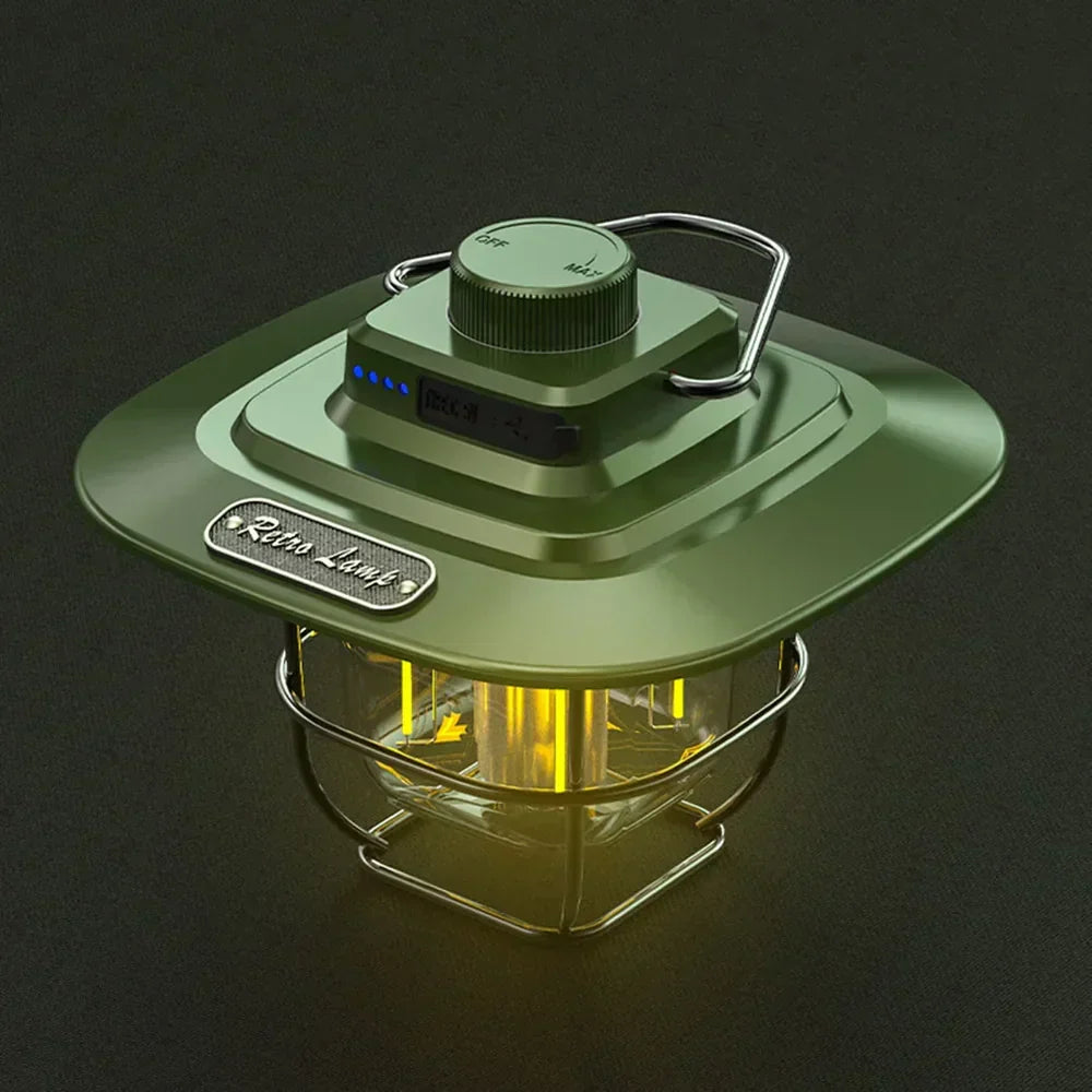 Green retro LED camping lantern sitting on a dark surface