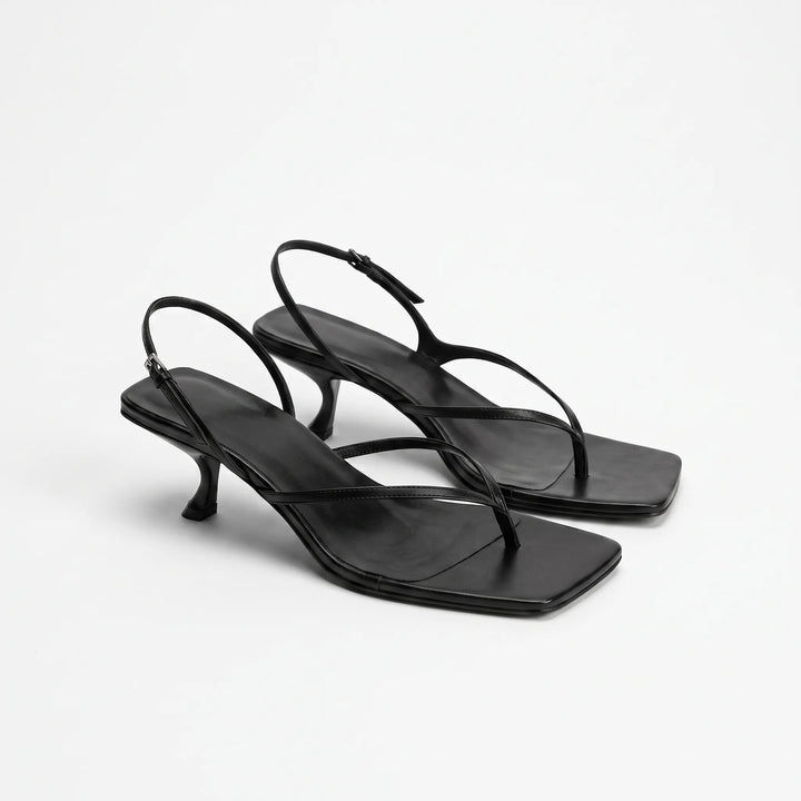 Black elegant kitten heel sandals featuring thong construction