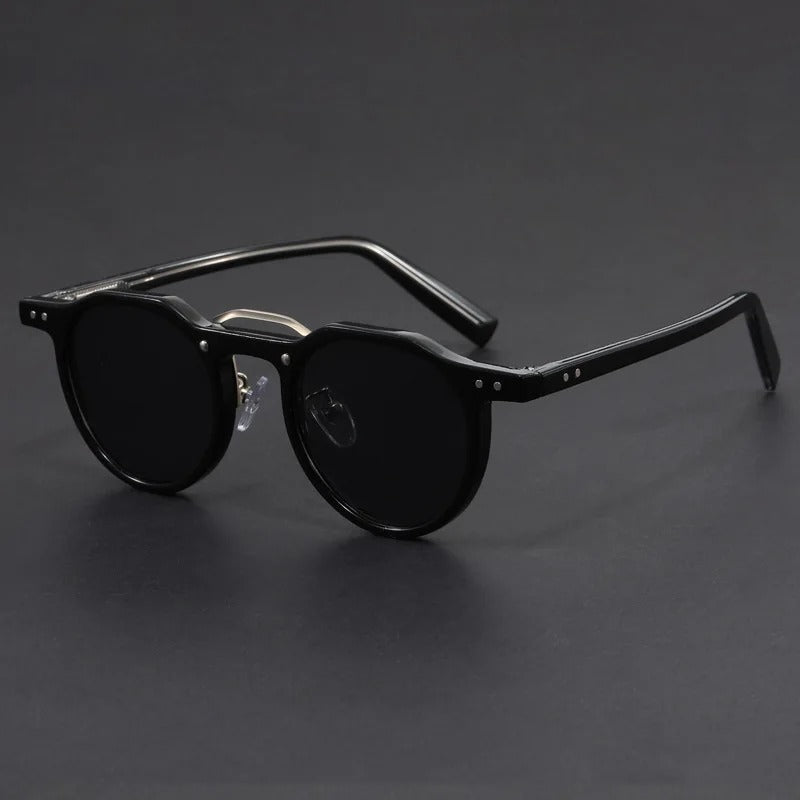 Classic black retro sunglasses showcasing sleek minimalist frame