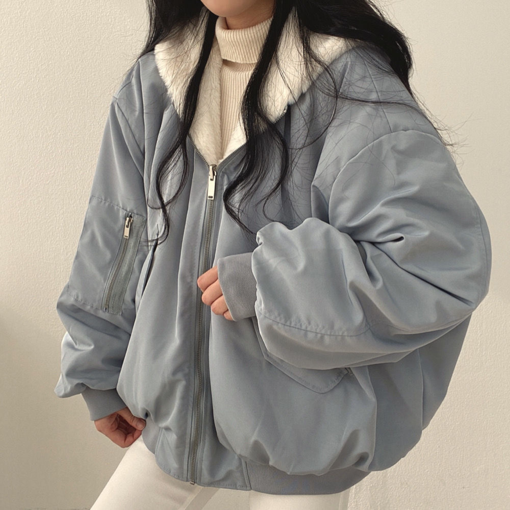 Side view of hooded winter jacket for women with warm quilted design