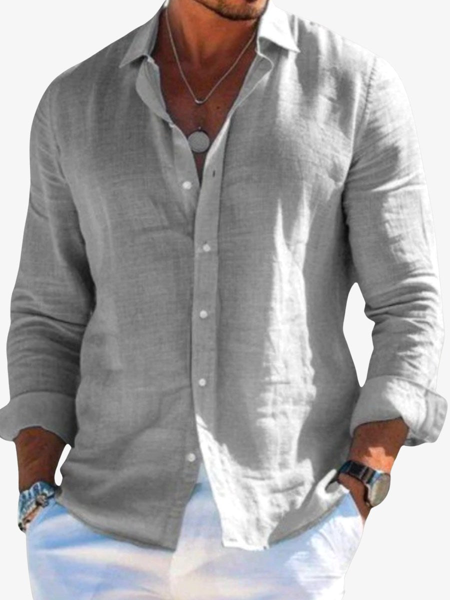 Man wearing a grey long sleeve casual button shirt