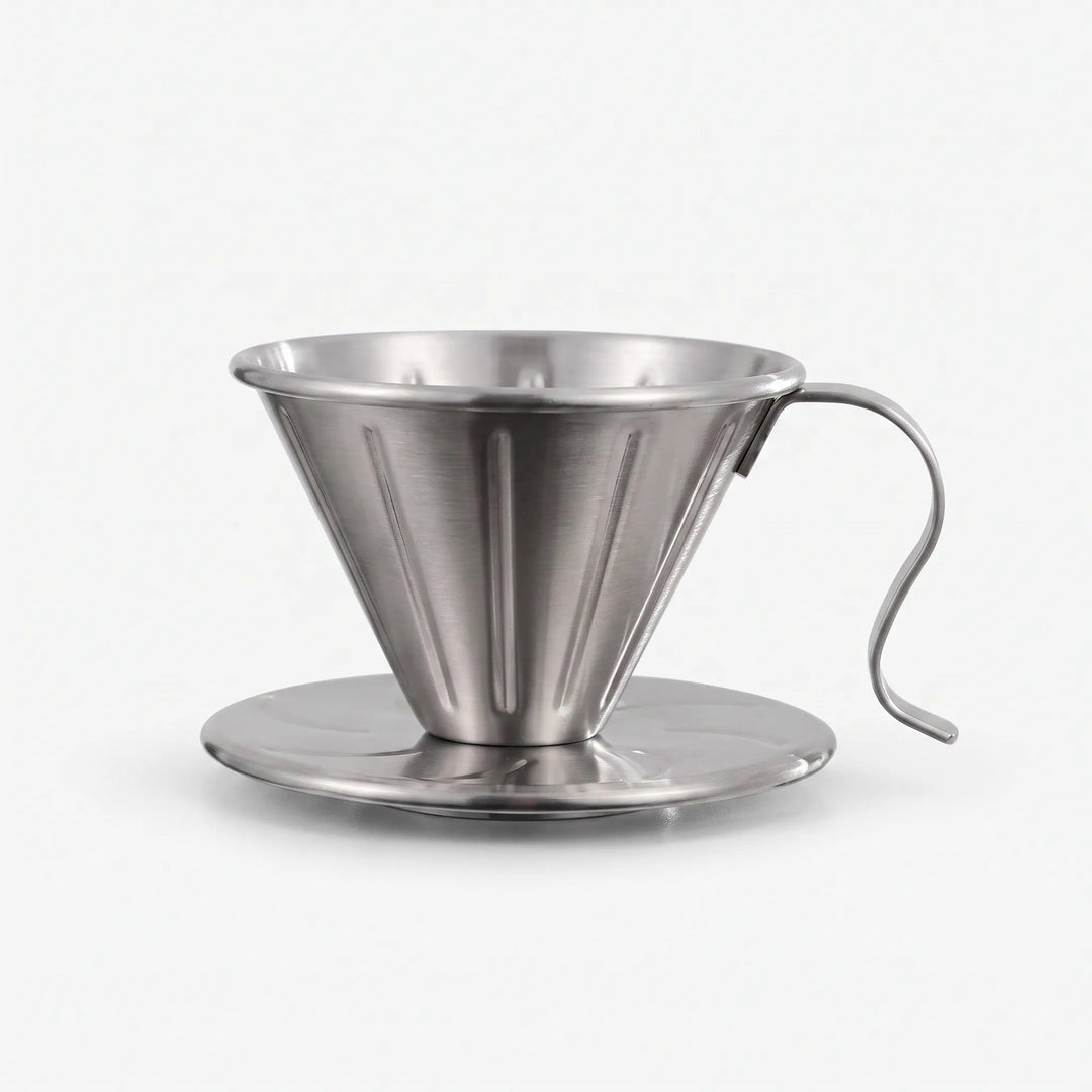 Stainless steel ribbed pour-over coffee dripper angled view