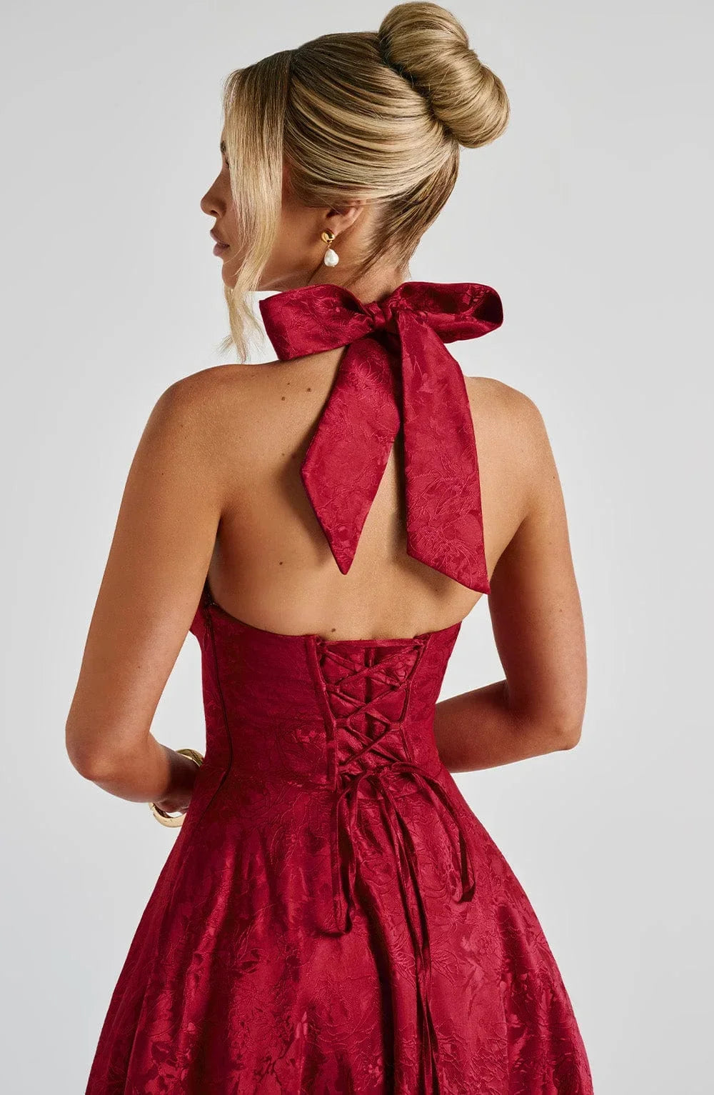 Stylish women's summer dress styled for a party