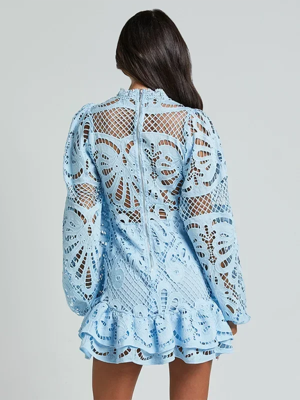 Back zipper and seam detail of women's long sleeve dress