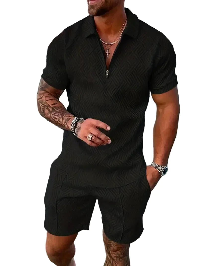 Close-up view of the black short-sleeved polo and shorts ensemble