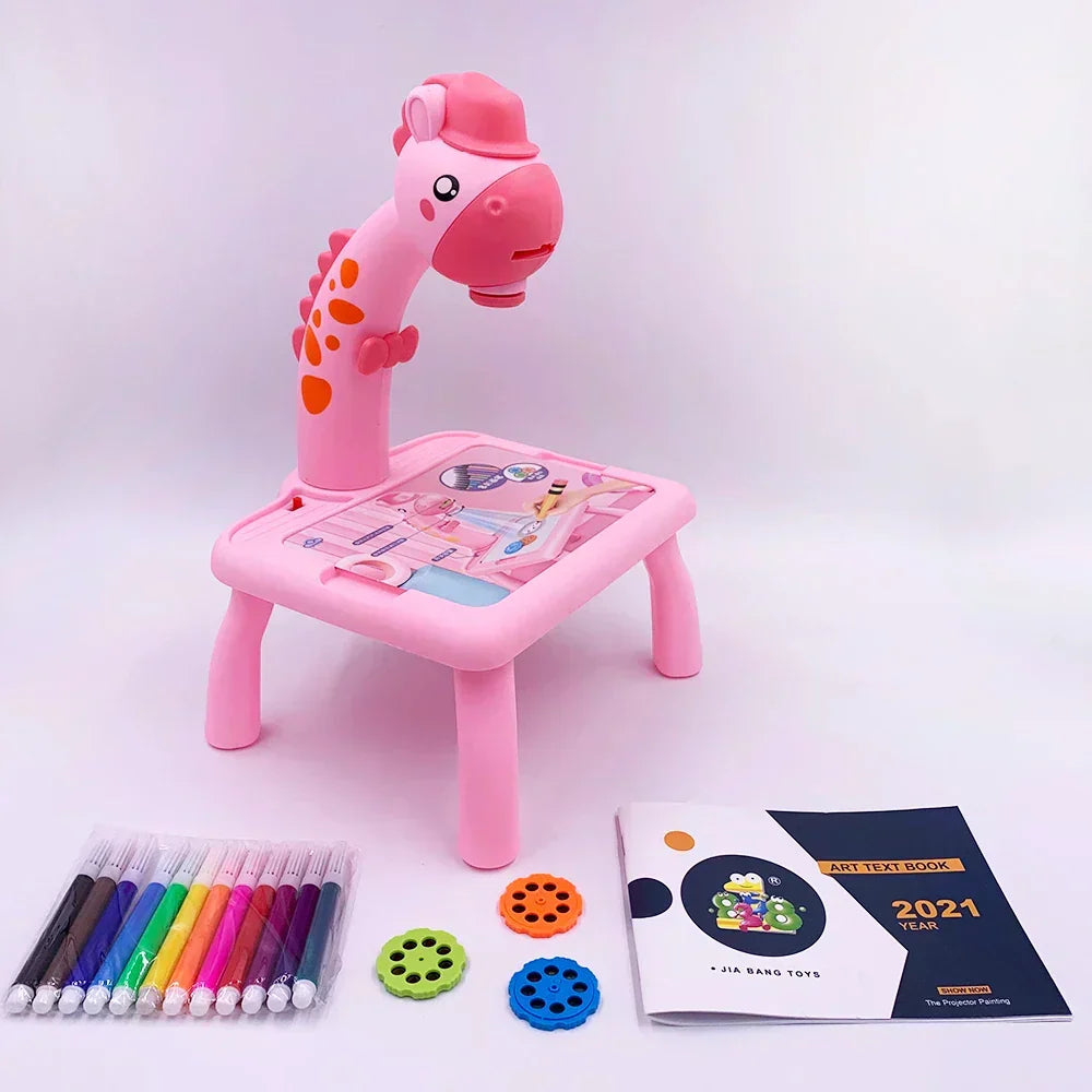 Pink dinosaur projection drawing table with included markers, projection discs, and drawing book