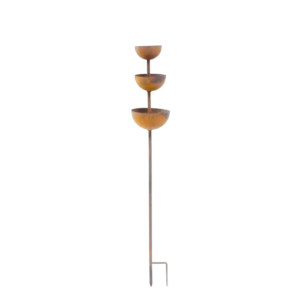 Rustic copper bird bath garden stake isolated on a plain background