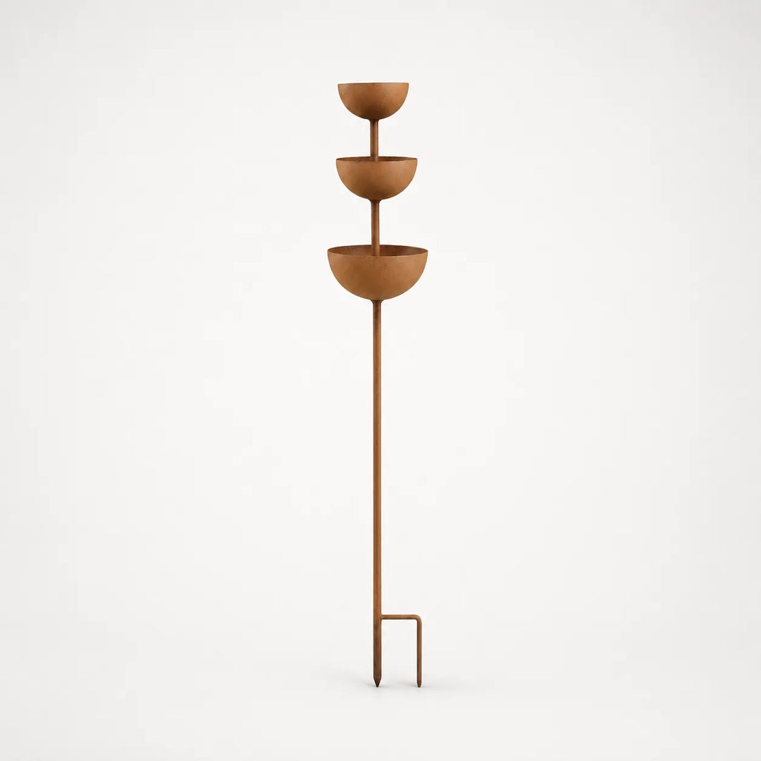 Full view of the three-tiered rustic iron bird bath stake