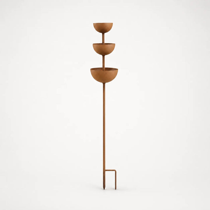 Full view of the three-tiered rustic iron bird bath stake
