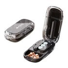 Compact black pill cutter and storage box closed and open