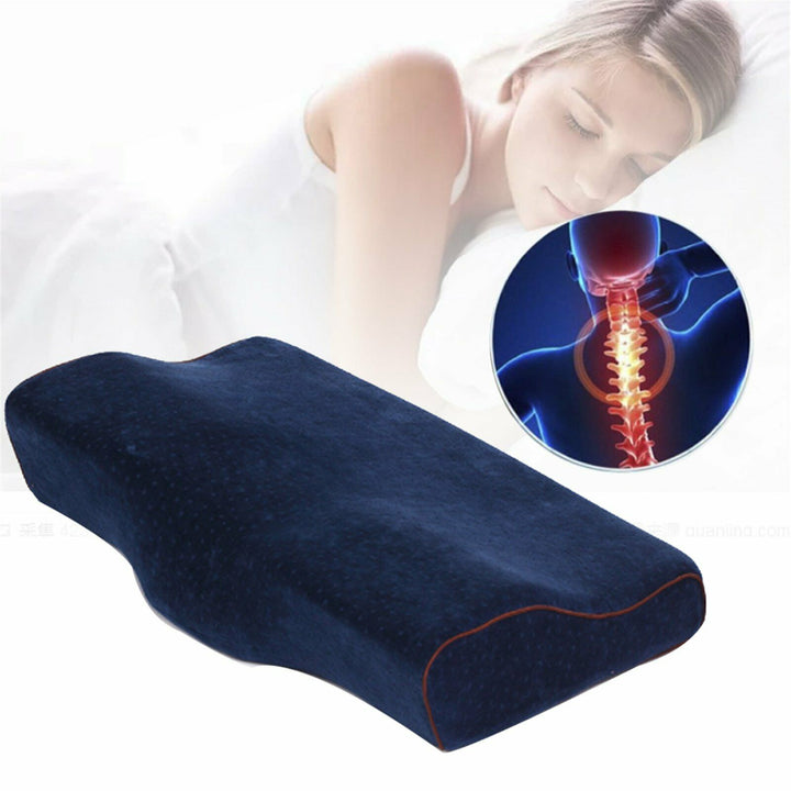 Navy blue ergonomic cervical pillow with anatomical spine alignment graphic inset