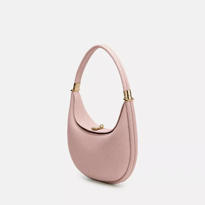 Interior view of chic accessory showing lined compartments and zipper pocket