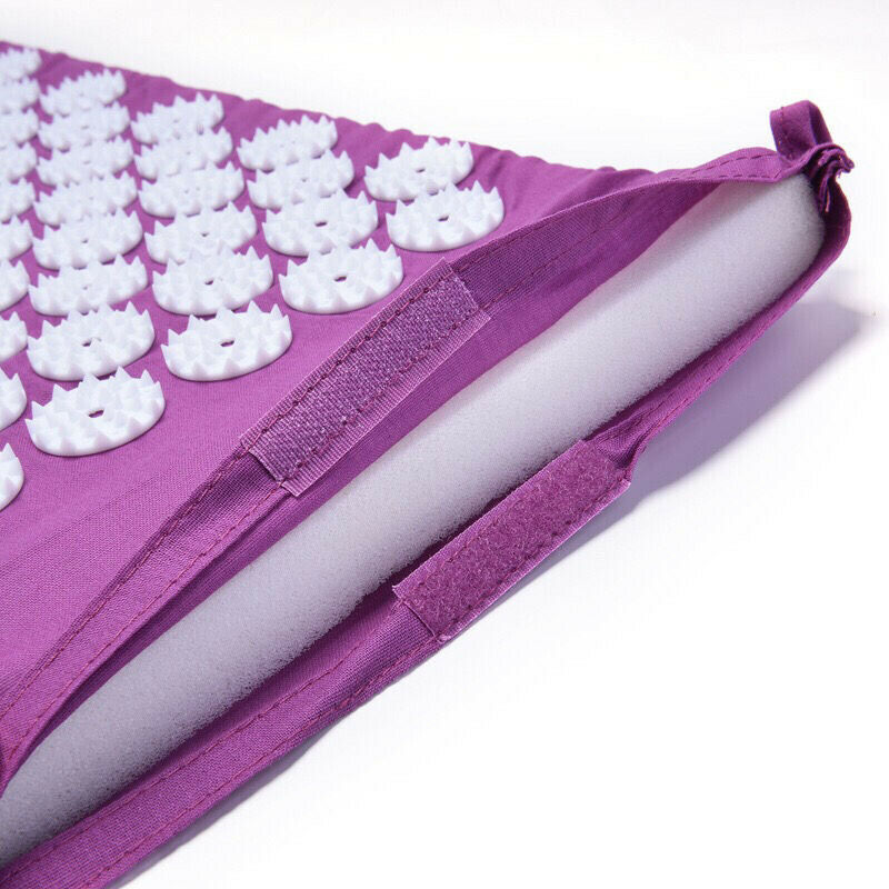 Close-up of spike massage pillow and acupressure mat texture for wellness