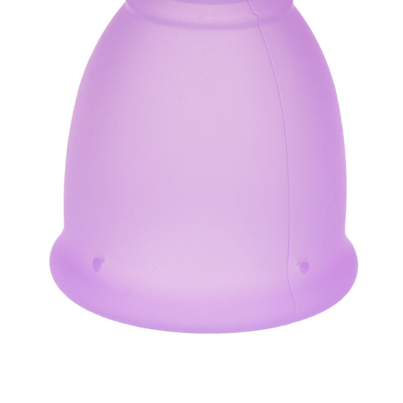Reusable period cup close-up highlighting flexible medical silicone material