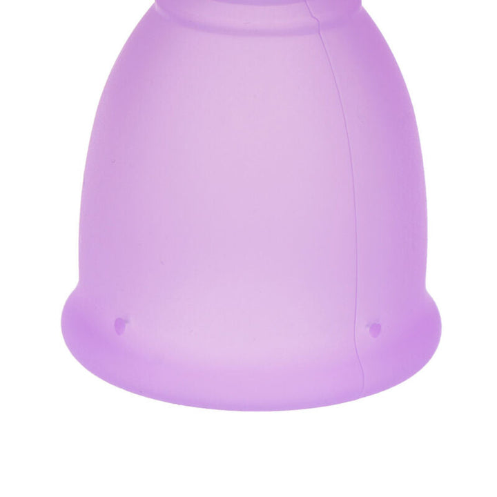 Reusable period cup close-up highlighting flexible medical silicone material