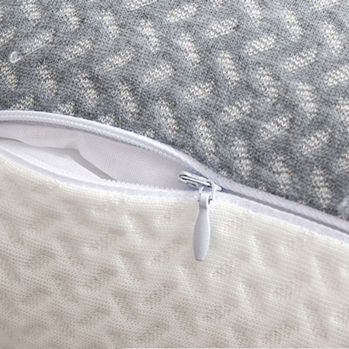 Sleep posture correction pillow angled to show ergonomic contouring