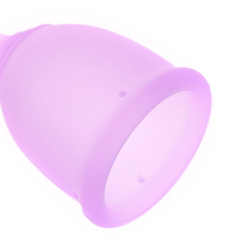 Leak-free period protection cup shown from a bottom grip angle