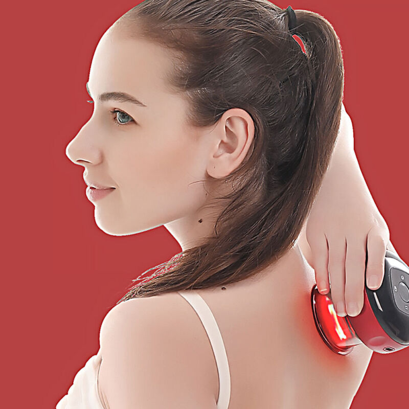Woman applying smart cup massager with red light to upper back