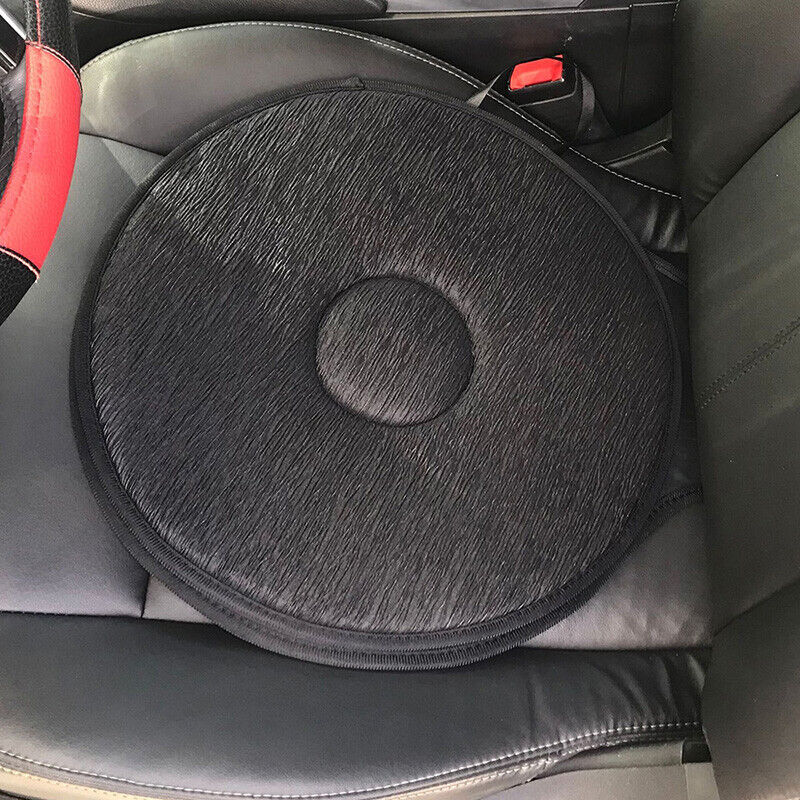 Black swivelling car seat cushion installed on a vehicle seat