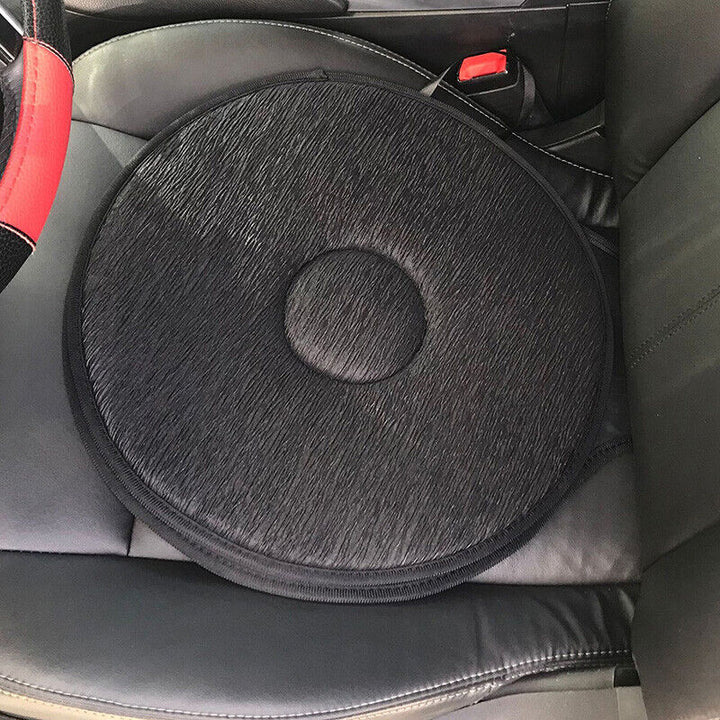 Black swivelling car seat cushion installed on a vehicle seat