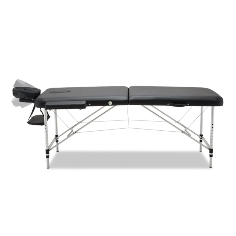 Professional spa bed folded into a compact carry case for easy transport