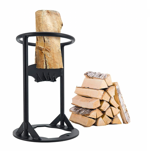 Black metal log splitter standing upright next to neatly stacked firewood pieces on a white background