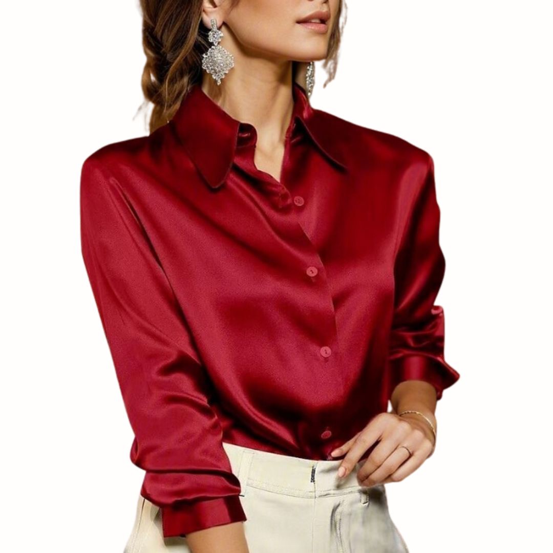 Woman wearing a red button-down blouse with long sleeves