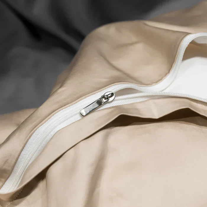 Luxora satin bedding set with elegant embroidery on luxury duvet cover